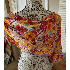 Stunning Just Stunning. Floral Print Blouse Top Multi-color with 1 puffy sleeve.